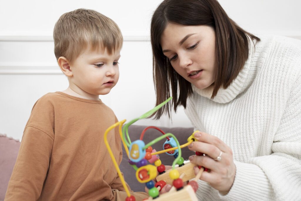 Beautiful therapist assisting a Child with SPO at Advantage Therapy Norwest NSW