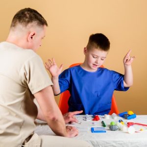 small-boy-with-dad-play-future-career-happy-child-with-father-with-stethoscope-childhood-parenting-family-doctor-medicine-health-father-son-medical-uniform-i-want-play_474717-51530